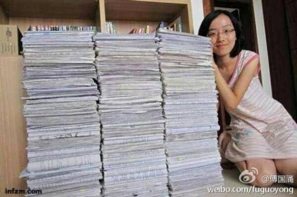 Girls shows how many exam papers she wrote in 3 years high school
