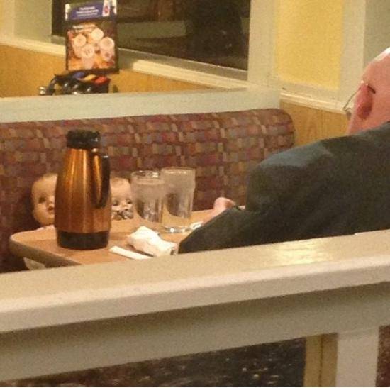 Stuff of nightmares: This couple was eating breakfast with two baby dolls across from them, they even ordered the dolls water.