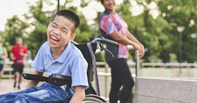 Boy Joyful While Swinging In A Disable-Friendly Playground, Shows Why We Need More Inclusivity