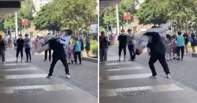 Girl Uses Black Widow's Signature Move While Fighting With Boyfriend In Front Of HK Restaurant